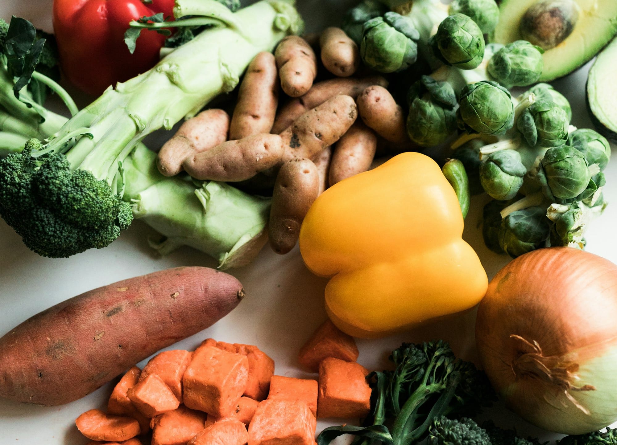 sliced carrots and green vegetable